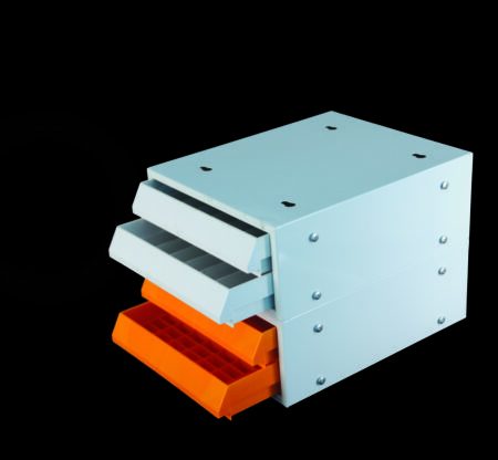 The Paraffin Block Storage Cabinet (299 x 252 x 110mm) features two ABS drawers with dividers, holds approx. 252 cassettes, and is made of iron with an orange plastic powder coating.