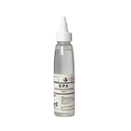 A clear squeeze bottle labeled "DPX Mountant (100ml/Clear Squeeze Bottle)" with a white nozzle cap, containing DPX mountant for laboratory use.