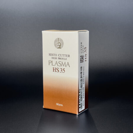 A box of Microtome Blade Histo Cutter Plasma HS35 Stainless Steel 80 x 14mm 35 Degree (50/Pack) is photographed against a dark background. The beige and brown box features black text and a barcode.