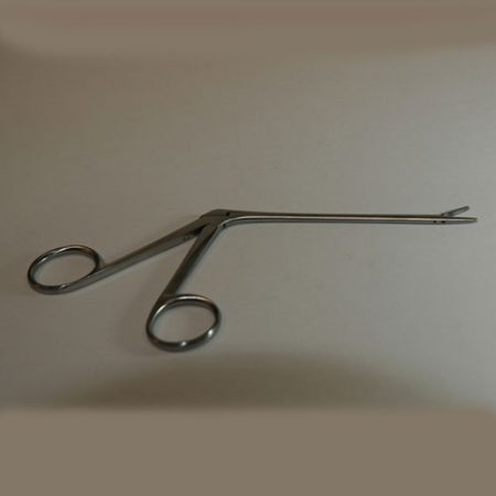 A pair of long shaft scissors on a white surface.