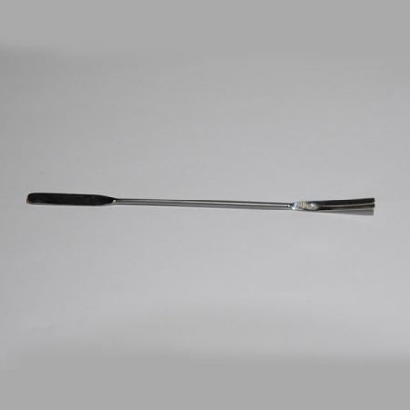 A black-handled metal brush on a white background.
