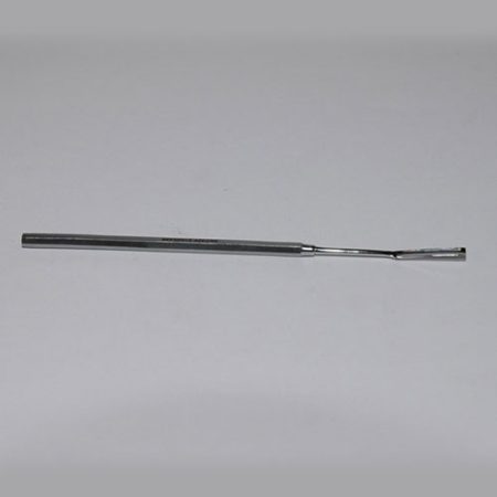 A Spatula Powder Micro with a Wide Blade is sitting on top of a white surface.