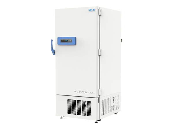 A tall, white Ultra Low Temperature Freezer -20 to -40°C, 528lt, Upright with a blue handle and a digital display panel on the door. This ultra low temperature freezer features various vents located at the bottom.
