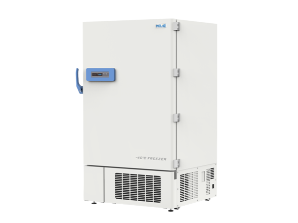 A tall, white Ultra Low Temperature Freezer -20 to -40°C, 778lt, Upright with a digital display and blue handle stands upright. The 778lt freezer has vents at the bottom and is labeled "-20 to -40°C Freezer.