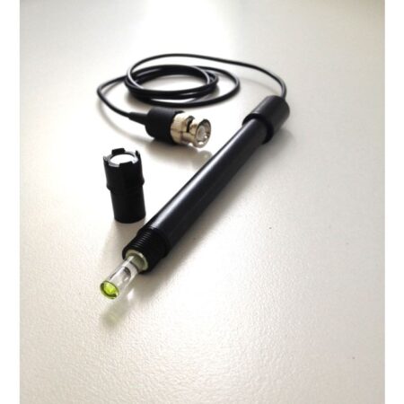 An Ammonia ISE with a 1mt cable and BNC connector rests on a light surface, its protective cap removed and placed nearby.