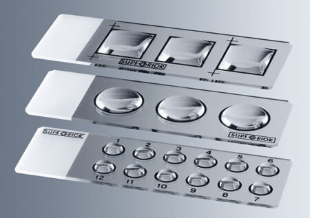 Adhesion Slides, 12 wells x 5mm Dia (100/Box), feature three stainless steel plates with various raised button or lens designs labeled "SUPERIOR" on a gray background—perfect for lab use.