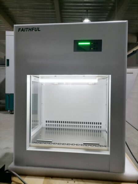 A Laminar Flow Cabinet, Vertical Class 100, featuring a colour screen LCD controller for operator and environment protection, with an illuminated interior.