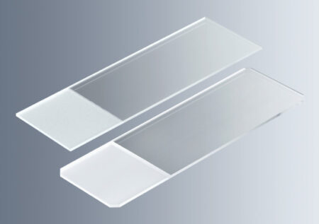 Two transparent HistoBond®+S Microscope Slides, white, with 90-degree ground edges and clipped corners for safety, are shown on a gray gradient background; each slide features a frosted end for labeling.