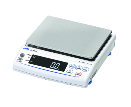 A digital laboratory scale with a stainless steel weighing platform and a digital display showing 0.0 grams, featuring various control buttons on the front panel.