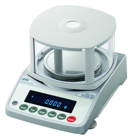 Digital laboratory balance scale with a transparent draft shield, digital display, and control buttons, showing a reading of 0.000 grams.