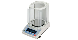 Digital analytical balance with a transparent draft shield and an electronic display showing a reading of 0.000 grams.