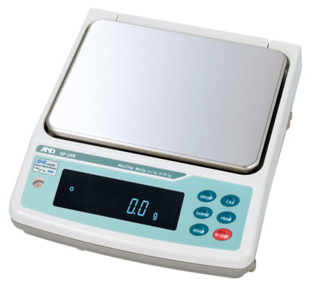 Electronic digital weighing scale with a stainless steel platform, display reading 0.0 grams, and multiple function buttons on the front.