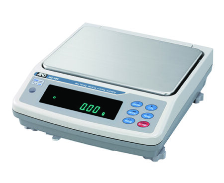 Digital laboratory weighing scale with a stainless steel platform, LED display showing zero, and several blue and red function buttons on the right side.