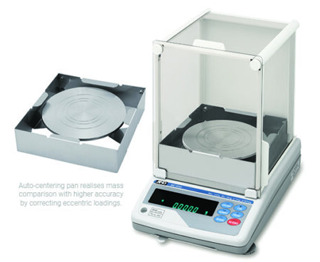 Digital laboratory balance with a transparent draft shield and auto-centering pan, showing a display reading 0.000, used for precise mass measurements.