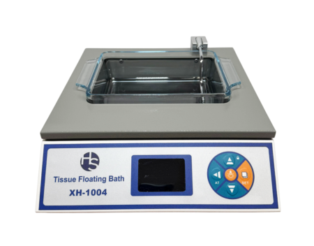 The Tissue Flotation Bath features an illuminated glass dish holding 1.5lt (21cm x 21cm x 5.3cm deep), offering a 30-75°C temperature range—ideal for labs preparing tissue samples.