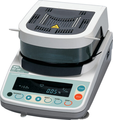 A digital moisture analyzer with a display screen, control buttons, and a heating chamber on top.
