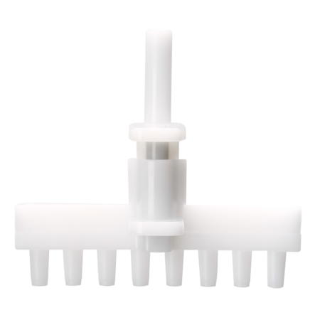 White plastic laboratory manifold with six tapered outlets and a central vertical inlet, photographed against a plain light background.