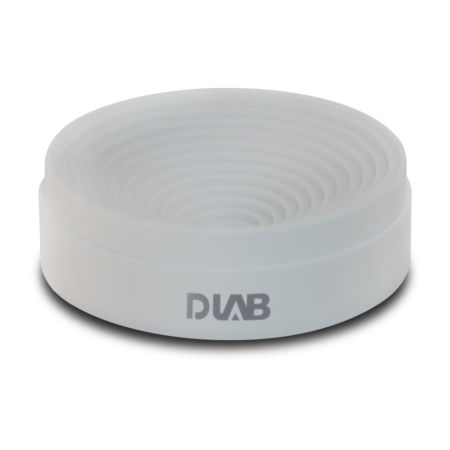 A round, white, ridged silicone container with the DUAB logo printed on the side, shown against a plain white background.
