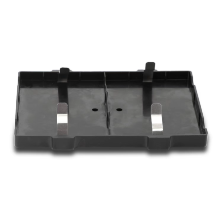 Black plastic rectangular tray with two central metal clips and two small holes, divided into two sections, on a plain light background.