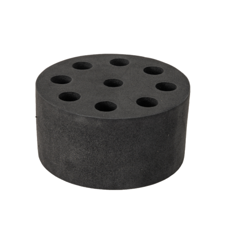 Round black foam block with nine evenly spaced holes on the top surface; typically used for organizing or holding items like tools or brushes.