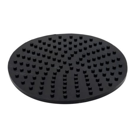 Black, round silicone mat with raised square bumps arranged in curved lines across the surface.