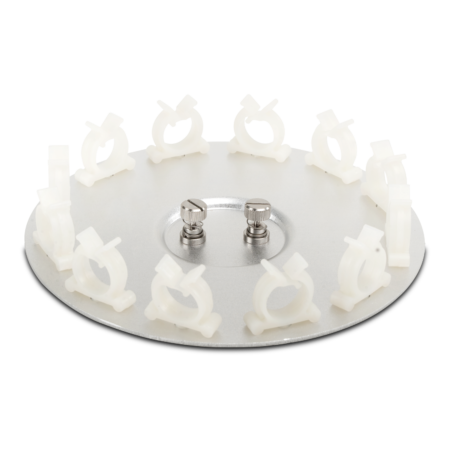 A metal circular base with two screws in the center and multiple white plastic clamps evenly spaced around the perimeter.