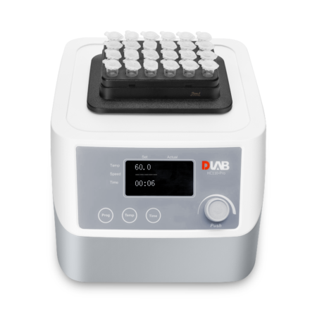 A laboratory dry bath incubator with digital display showing 60°C temperature and 6 minutes; holds a block with multiple capped test tubes.
