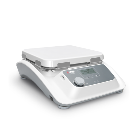 Digital laboratory weighing scale with a flat white platform, digital display, and control buttons on a gray and white body, placed on a light surface.