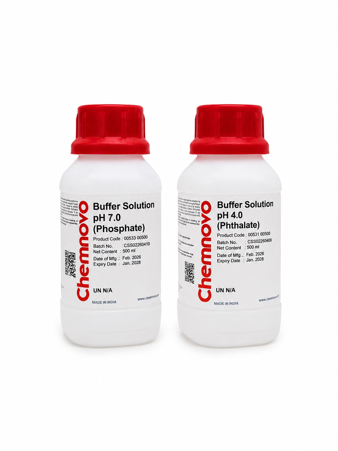 Two clear white bottles with red caps labeled “ph buffer solution clear”—one containing phosphate buffer at pH 7.0 and the other containing phthalate buffer at pH 4.0—standing side by side.