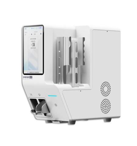 The SurePrint S10 Laser Microscope Slide Printer features a white, box-shaped design with a digital display for data readout and a slot for inserting samples; it delivers precise on demand output for medical analysis.